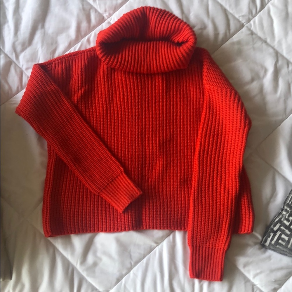 red fold over turtle neck sweater